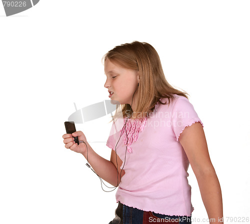 Image of young girl singing dancing with mp3