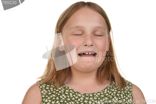 Image of young girl crying and unhappy