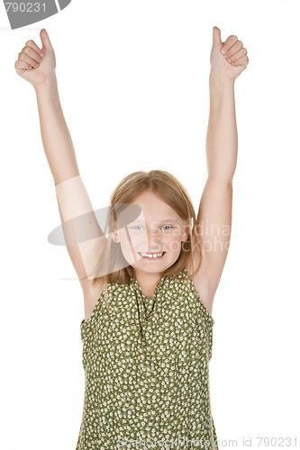 Image of young girl happy arms raised