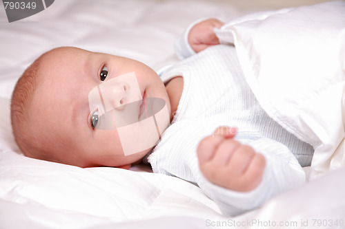 Image of Adorable newborn in bed