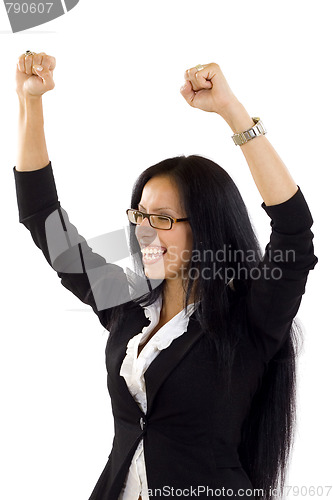 Image of beautiful young business woman raising arms
