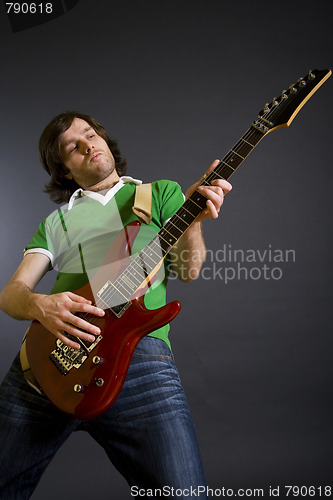 Image of Electric guitar player