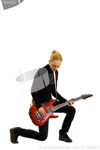 Image of woman guitarist playing