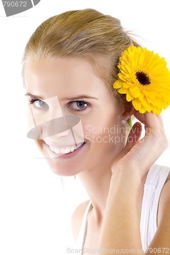 Image of   Young beautiful girl with flower
