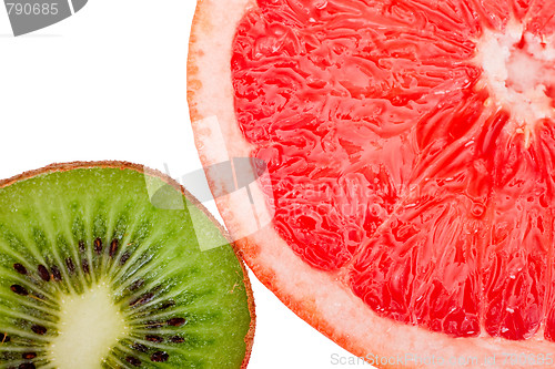 Image of Macro shot of a red grapefruit and a kiwi isolated on white