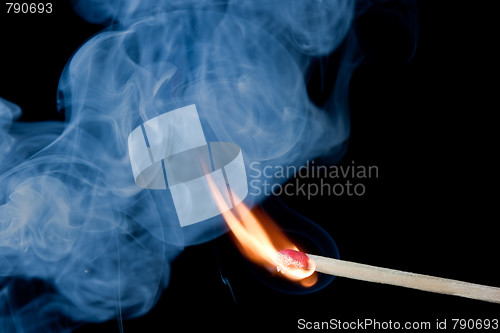 Image of Burning match