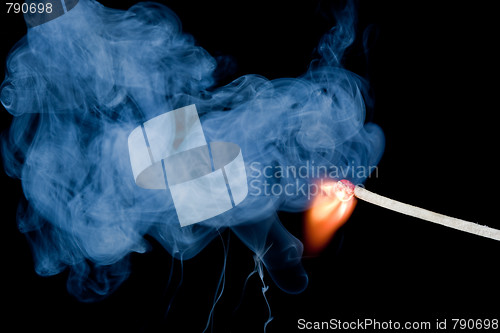 Image of Burning match