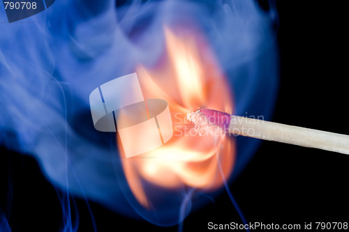 Image of Burning match