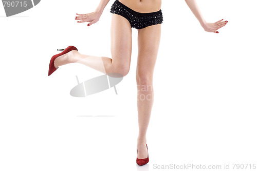 Image of Woman legs standing on white background