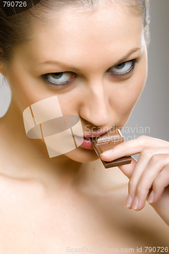 Image of Sexy girl eating chocolate