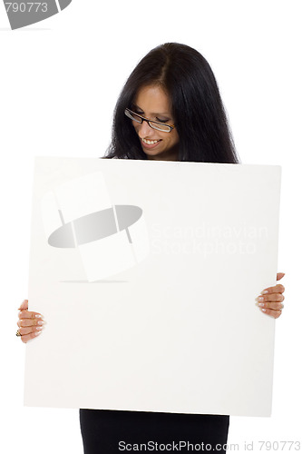Image of Young woman holding blank sign