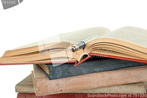 Image of old books and pen