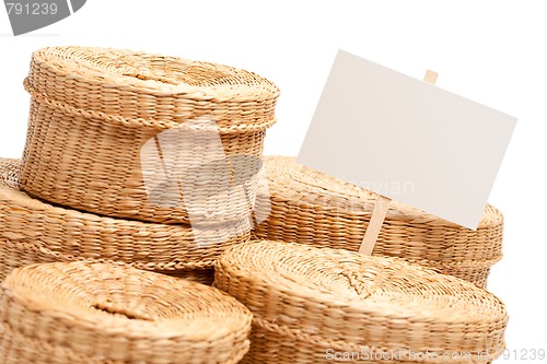 Image of Various Sized Wicker Baskets with Blank Sign on White