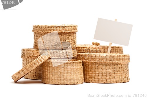 Image of Various Sized Wicker Baskets with Blank Sign on White