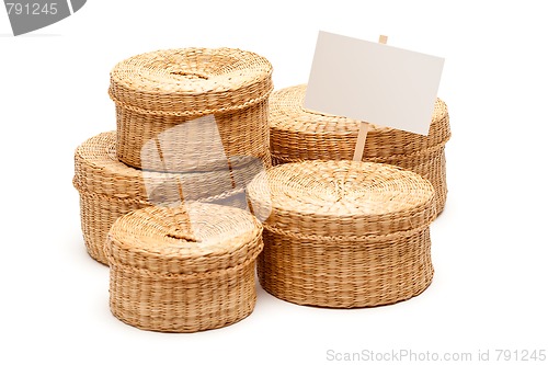 Image of Various Sized Wicker Baskets with Blank Sign on White