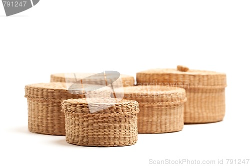 Image of Various Sized Wicker Baskets on White