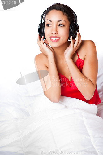 Image of Woman listening to music