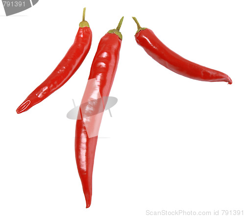 Image of Three red peppers.