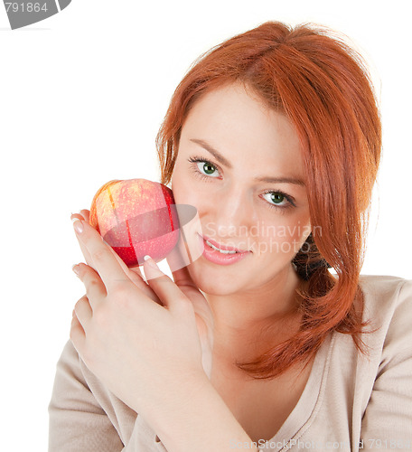 Image of redhead girl with apple