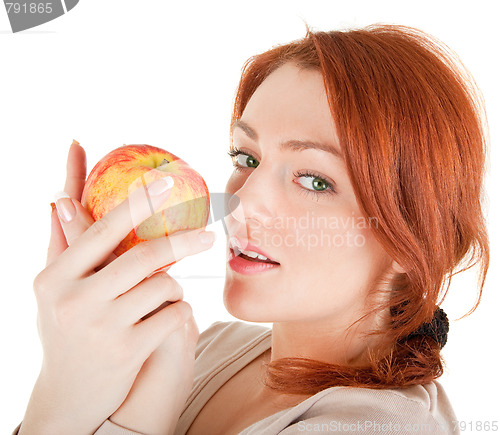 Image of redhead girl with apple