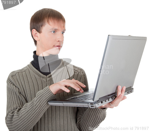 Image of young man with laptop