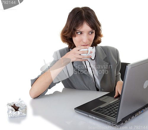 Image of young girl in office clouses