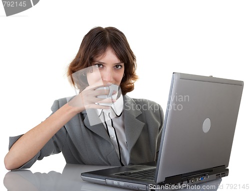 Image of young girl in office clouses