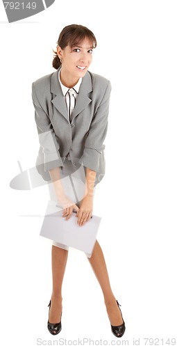 Image of young girl in office clouses