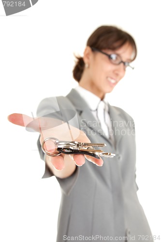 Image of young business girl with keys