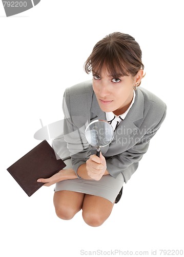 Image of young girl in office clouses