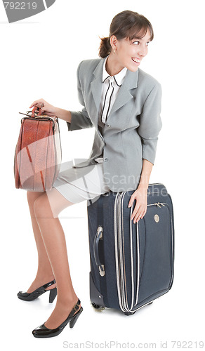 Image of woman  with a luggage