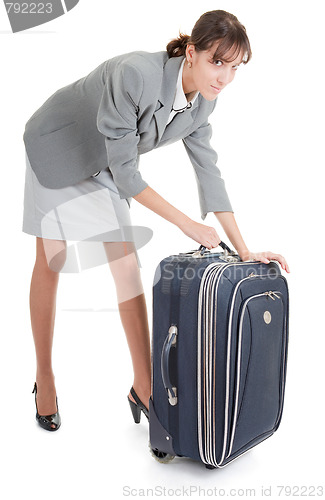 Image of woman  with a luggage