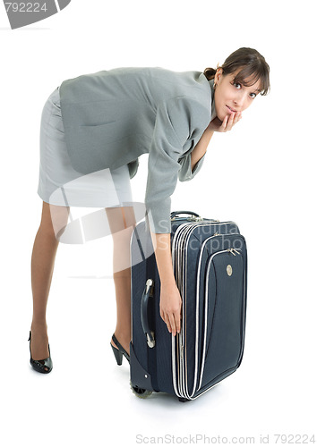 Image of woman  with a luggage