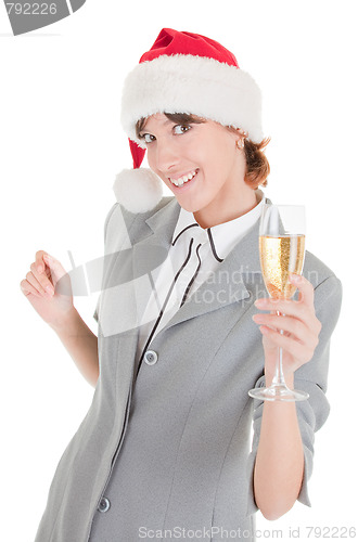 Image of business girl in Santa hat and with champagne