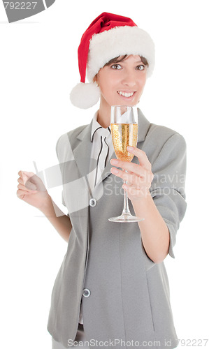 Image of business girl in Santa hat and with champagne