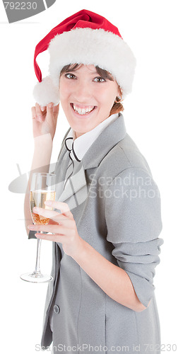 Image of business girl in Santa hat and with champagne