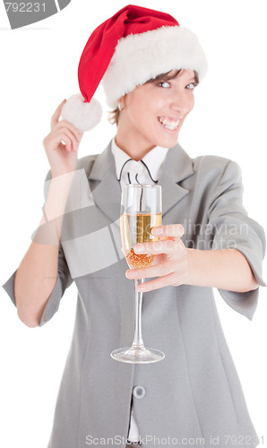 Image of business girl in Santa hat and with champagne