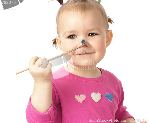 Image of Little girl paint on her nose