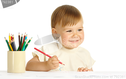 Image of Child draw with red crayon