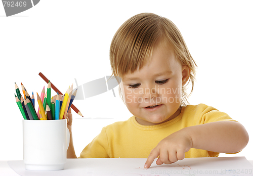Image of Child points on his drawing