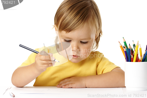Image of Cute child draw with color crayons