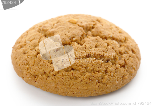 Image of Single yellow cookie on white background