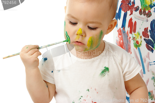 Image of Little girl paint on her cheek