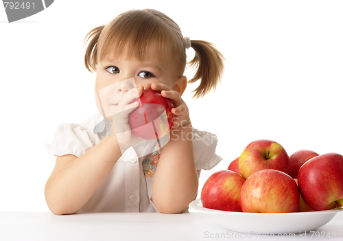 Image of Cute child with apples