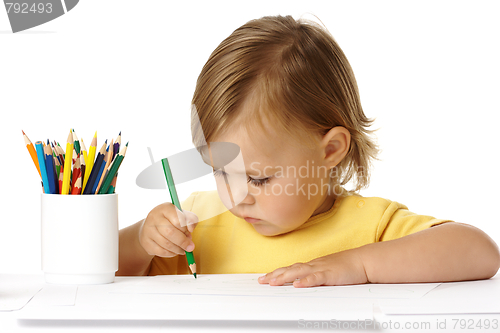 Image of Child draw with green crayon
