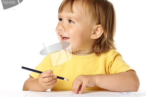 Image of Happy child draw with crayons and smile