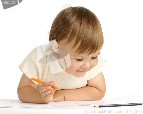 Image of Child draw with orange crayon