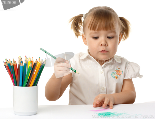 Image of Cute child draw with color pencils