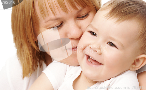 Image of Mother embracing her happy child