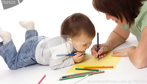 Image of Mother teach her child to draw